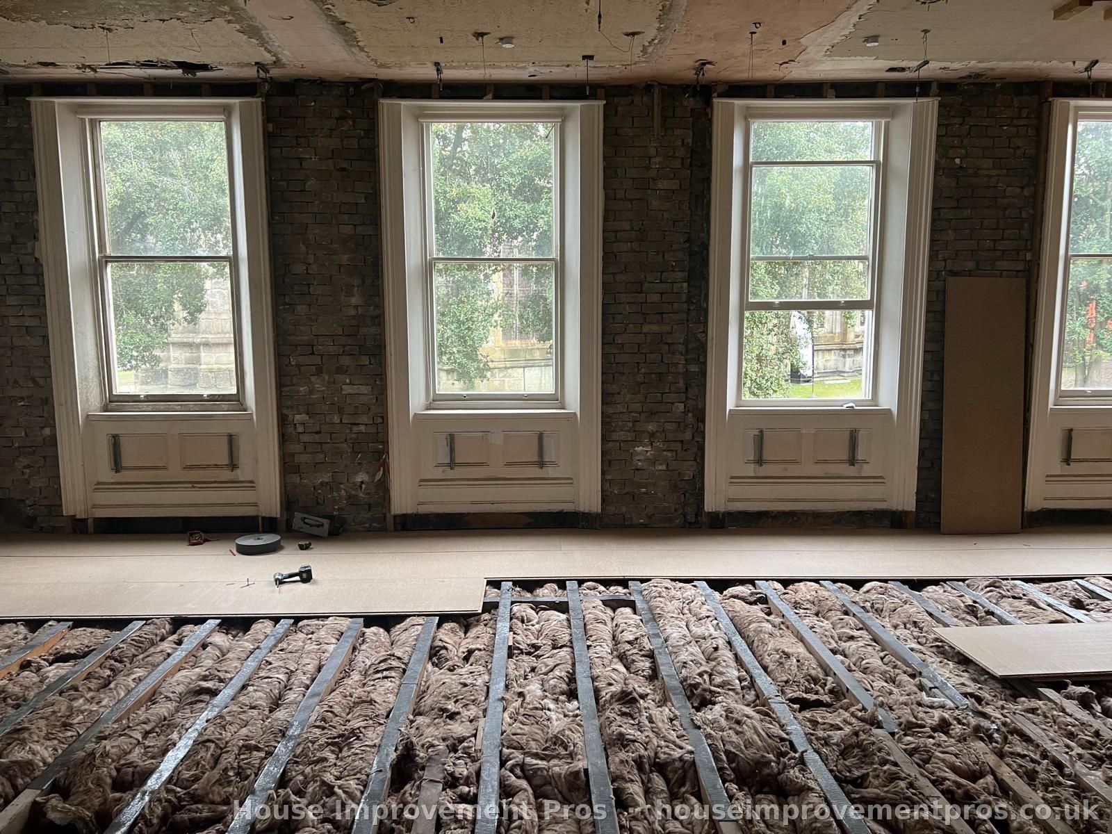 Strip-out: floors opened for structural repair